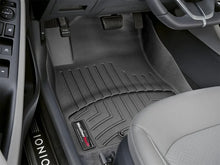 Load image into Gallery viewer, WeatherTech 08-13 Toyota Highlander Front FloorLiner - Black - Installation View