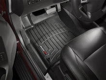 Load image into Gallery viewer, WeatherTech 08+ Nissan Armada Front FloorLiner - Black - Installation View