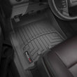 Load image into Gallery viewer, WeatherTech 11-17 Ford Navigator/Navigator L Front FloorLiner - Black - Installation View