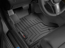 Load image into Gallery viewer, WeatherTech 11+ BMW 5-Series Front FloorLiner - Black - Installation View