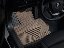 Load image into Gallery viewer, WeatherTech 11+ BMW X3 Front Rubber Mats - Tan - Installation View