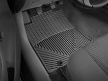 Load image into Gallery viewer, WeatherTech 12-13 Toyota Tacoma Front Rubber Mats - Black - Installation View