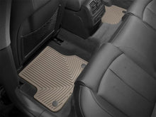 Load image into Gallery viewer, WeatherTech 12+ Audi A6/S6 Rear Rubber Mats - Tan - Installation View