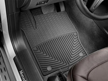 Load image into Gallery viewer, WeatherTech 12+ Mercedes-Benz ML-Class Front Rubber Mats - Black - Installation View