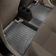 Load image into Gallery viewer, WeatherTech 12+ Nissan Versa Rear FloorLiner - Black - Installation View