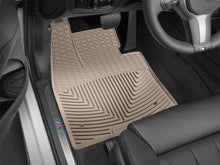 Load image into Gallery viewer, WeatherTech 14-15 BMW X5 Front Rubber Mats - Tan - Installation View