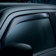 Load image into Gallery viewer, WeatherTech 14+ Chevrolet Silverado Front Side Window Deflectors - Dark Smoke - Back View