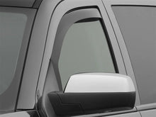 Load image into Gallery viewer, WeatherTech 14+ Chevrolet Silverado Front Side Window Deflectors - Dark Smoke - Installation View