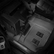 Load image into Gallery viewer, WeatherTech 15+ Chevrolet Suburban (Fits Vehicles w/ 2nd Row Bucket Seats) Rear FloorLiners - Black - Installation View