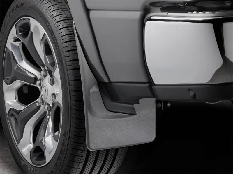 WeatherTech 19+ Dodge Ram w/ Factory Flares Rear No Drill Mudflaps - Black - Side View