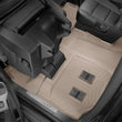Load image into Gallery viewer, WeatherTech 2015+ Chevrolet Suburban w/ 2nd Row Bucket Seats Rear FloorLiner - Tan - Installation View