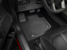 Load image into Gallery viewer, WeatherTech 2015+ Ford F-150 Front Rubber Mats - Black - Installation View