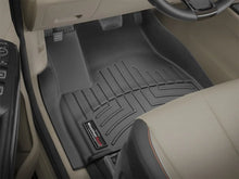 Load image into Gallery viewer, WeatherTech 2015 Kia Sedona Front FloorLiner - Black - Installation View