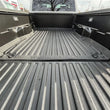 Load image into Gallery viewer, WeatherTech 2024 Toyota Tacoma 6in Truck Bed / No RHS Storage Impact Liner - Black - Side View