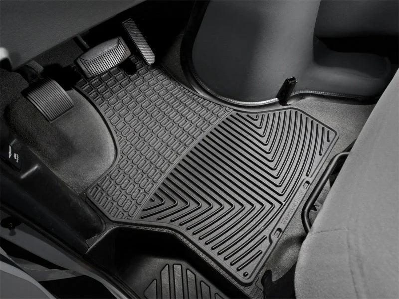 WeatherTech 95-05 Chevrolet Astro Van Front Rubber Mats - Black - Installation View