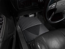 Load image into Gallery viewer, WeatherTech 99-00 Chevrolet Silverado Crew Cab Front Rubber Mats - Black - Installation View