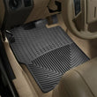 Load image into Gallery viewer, WeatherTech 99-07 Ford F250 Super Duty Crew Front Rubber Mats - Black - Installation View