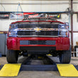 Load image into Gallery viewer, Wehrli 15-19 Chevrolet 2500/3500 Front Bumper Valance Filler Panel Kit w/o Tow Hooks - Texture Black - Side View
