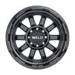 Load image into Gallery viewer, Weld Off-Road W168 20X9 Stealth 6X135 6X139.7 ET00 BS5.00 Gloss Black 106.1 - Detail View