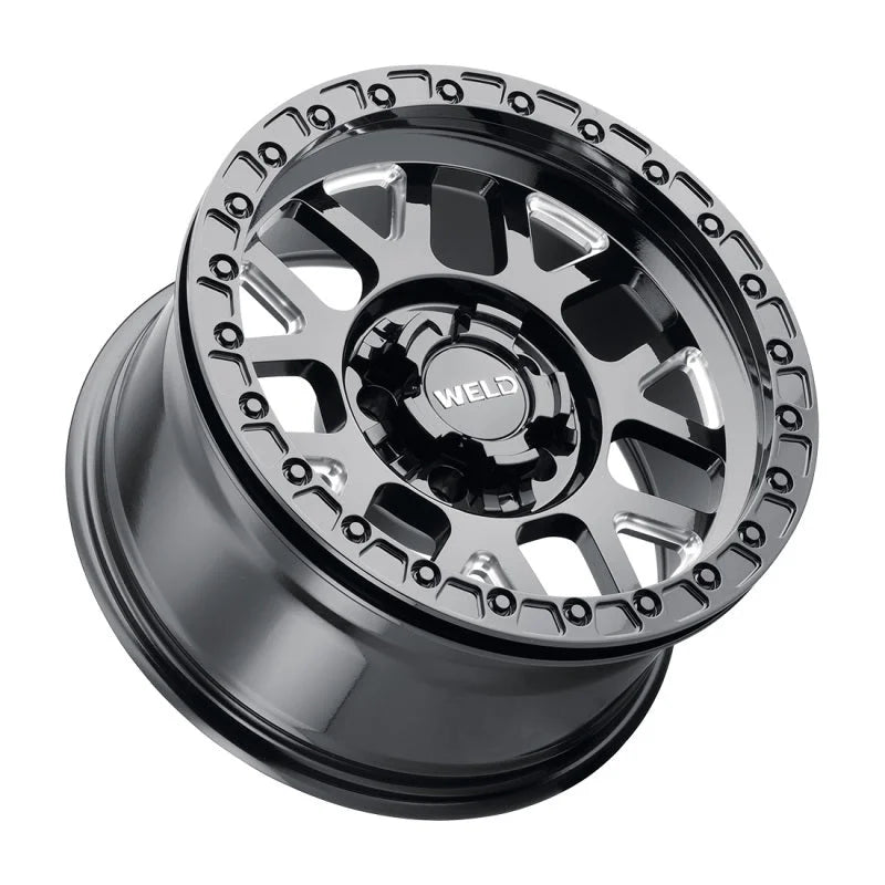 Weld Off-Road W902 17X10 Cinch Beadlock 5X127 5X139.7 ET-24 BS4.50 Gloss BLK MIL / BLK Ring 87.1 - Side View