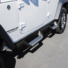 Load image into Gallery viewer, Westin 07-18 Jeep Wrangler JKU 4dr. HDX Stainless Drop Nerf Step Bars - Tex. Blk - Side View