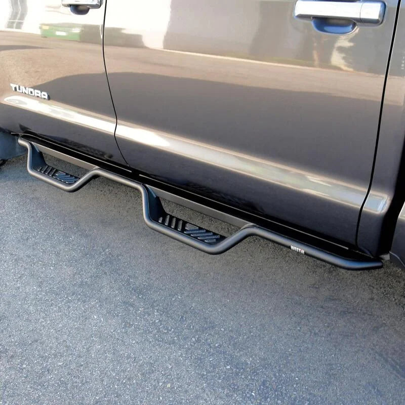 Westin 07-21 Toyota Tundra CrewMax Outlaw Drop Nerf Step Bars - Black - Side View