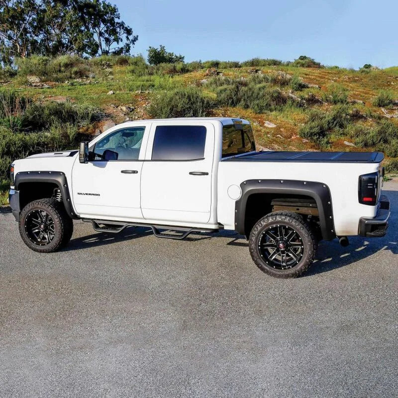 Westin 14-18 Chevrolet Silverado / GMC Sierra Crew Cab Outlaw Nerf Step Bars (Excl. Diesel) - Installation View