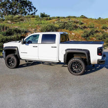 Load image into Gallery viewer, Westin 14-18 Chevrolet Silverado / GMC Sierra Crew Cab Outlaw Nerf Step Bars (Excl. Diesel) - Installation View