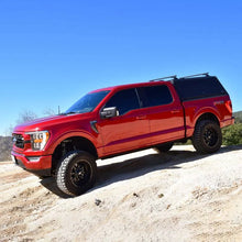 Load image into Gallery viewer, Westin 15-25 F-150 CC 5.5ft. Bed EXP Truck Cap - Black (Box 2 ONLY) - Installation View