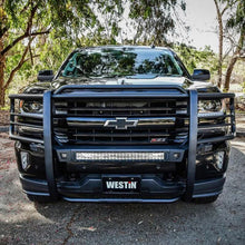 Load image into Gallery viewer, Westin 16-18 Chevy Silverado 1500 Sportsman X Grille Guard - Textured Black - Installation View