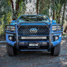 Load image into Gallery viewer, Westin 16-21 Toyota Tacoma Sportsman X Grille Guard - Tex. Blk - Back View