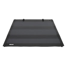 Load image into Gallery viewer, Westin 16-23 Toyota Tacoma 2WD/4WD 5ft. Bed Hard Tri-Fold Tonneau Cover - Black - Side View