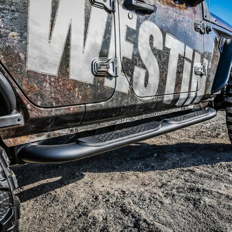 Westin 18-22 Jeep Wrangler JLU 4dr Platinum 4 Oval Nerf Step Bars - Tex. Blk - Side View