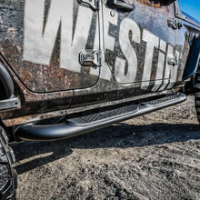 Load image into Gallery viewer, Westin 18-22 Jeep Wrangler JLU 4dr Platinum 4 Oval Nerf Step Bars - Tex. Blk - Side View