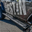 Load image into Gallery viewer, Westin 18-22 Jeep Wrangler JLU 4dr R5 Nerf Step Bars - Tex. Blk - Installation View