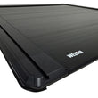 Load image into Gallery viewer, Westin 19-26 RAM 1500 New Body 5ft 7in. (67in) Bed Electric Retractable Tonneau Cover - Black - Back View