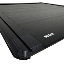 Load image into Gallery viewer, Westin 19-26 RAM 1500 New Body 5ft 7in. (67in) Bed Electric Retractable Tonneau Cover - Black - Back View