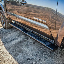 Load image into Gallery viewer, Westin 2005-2018 Toyota Tacoma Double Cab R5 Nerf Step Bars - Black - Installation View