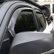 Load image into Gallery viewer, Westin 2016-2018 Toyota Tacoma Double Cab 4dr Wade In-Channel Wind Deflector 4pc - Smoke - Side View