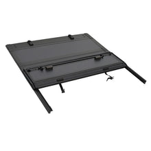 Load image into Gallery viewer, Westin 2024 Toyota Tacoma 2WD/4WD 5ft. Bed Hard Tri-Fold Tonneau Cover - Black - Installation View