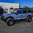Load image into Gallery viewer, Westin 21-23 Ford Bronco 4dr (Excl. Bronco Sport) Pro-e Running Boards - Tex. Blk - Back View