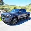 Load image into Gallery viewer, Westin 24+ Tacoma Double Cab R5 Nerf Step Bars - Side View