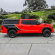 Load image into Gallery viewer, Westin EXP Truck Cap COMPLETE KIT A + B (22-25 Toyota Tundra CC 5.5ft. Bed) - Back View