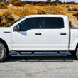 Load image into Gallery viewer, Westin Ram 15-21 Ford F-150 / 17-21 Ford F-250 &amp; F350 Crew Cab R5 XD Nerf Step Bars - Black - Installation View