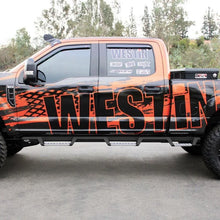 Load image into Gallery viewer, Westin/HDX 17-18 Ford F-250/350 Crew Cab (6.75ft Bed) Stainless Drop Nerf Step Bars - Textured Black - Side View