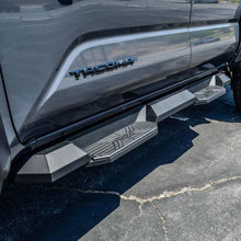 Load image into Gallery viewer, Westin/HDX 2024+ Toyota Tacoma Double Cab Xtreme Nerf Step Bars - Textured Black - Installation View