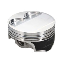 Load image into Gallery viewer, Wiseco Nissan VR38DETT 95.50 mm Bore 34.30 mm CH -1.20 CC Piston Set - Installation View