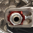 Load image into Gallery viewer, Works Connection Elite Axle Block - Red - Side View