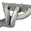 Load image into Gallery viewer, aFe 08-13 BMW 128i (E82/88) L6 3.0L Twisted Steel 304 Stainless Steel Long Tube Header w/ Cat - Installation View