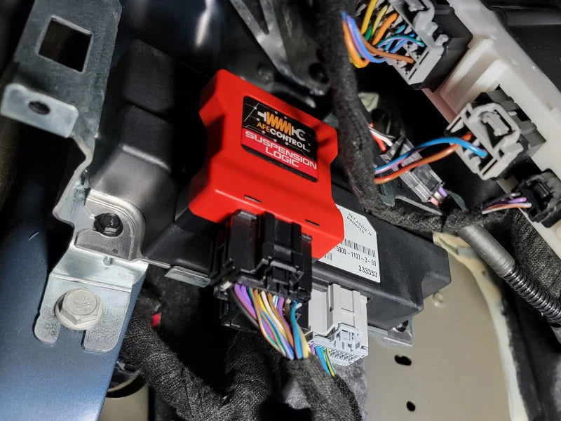 aFe 19-20 Ford F150 Raptor V6 3.5L Suspension Logic Electronic Shock Delete Module - Side View